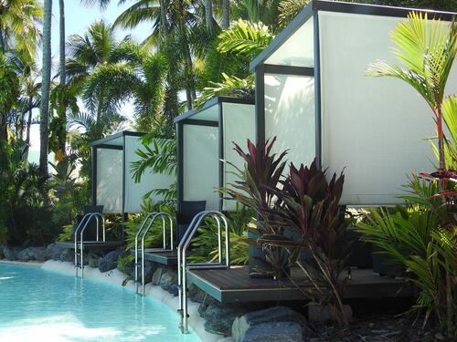 Custom built cabanas that surround the pool at the Sheraton Grand Mirage Resort, Port Douglas.